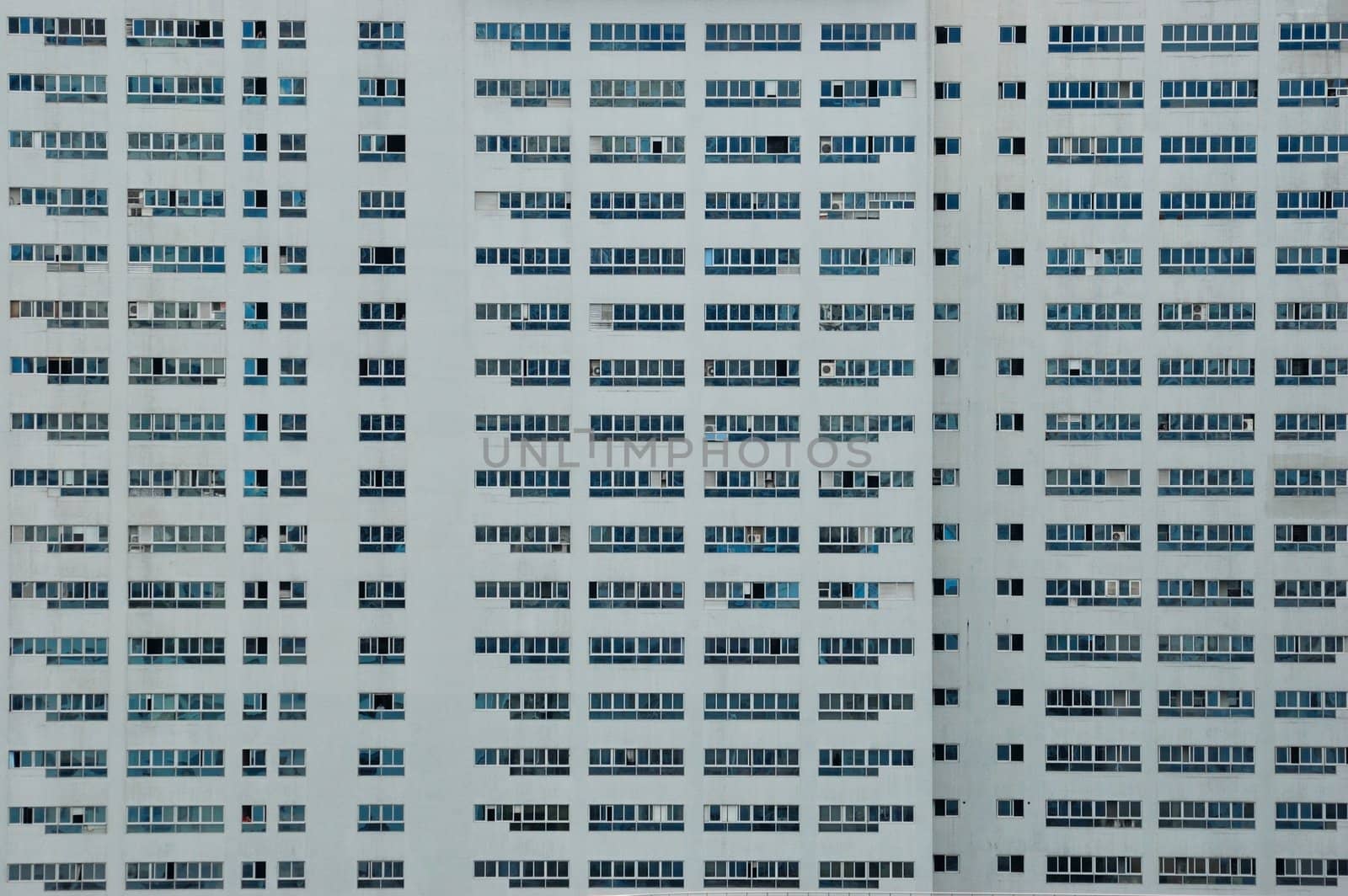 Shenzhen city in China. Large buidling with hundreds of windows, offices and apartments. 