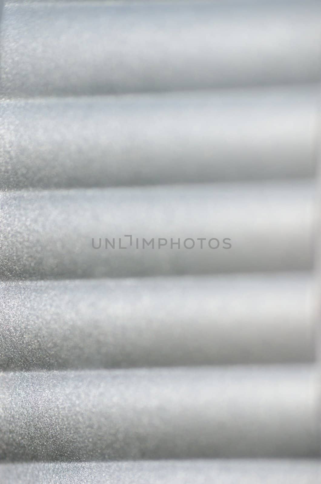 Closeup photo showing silver pattern. Simple texture with horizontal lines and structure.