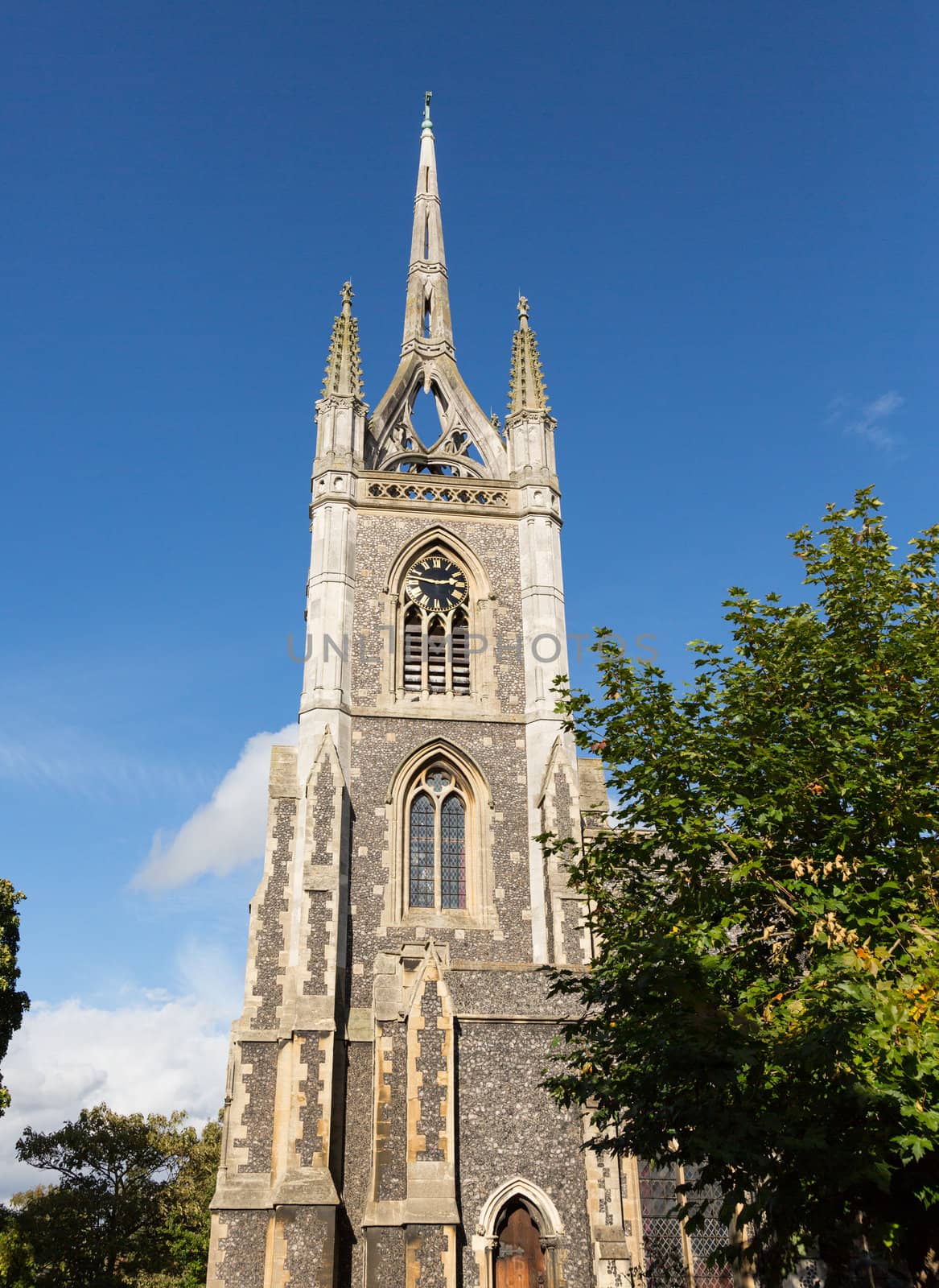 Old and unique church tower in Faversham Kent with crown spire on top