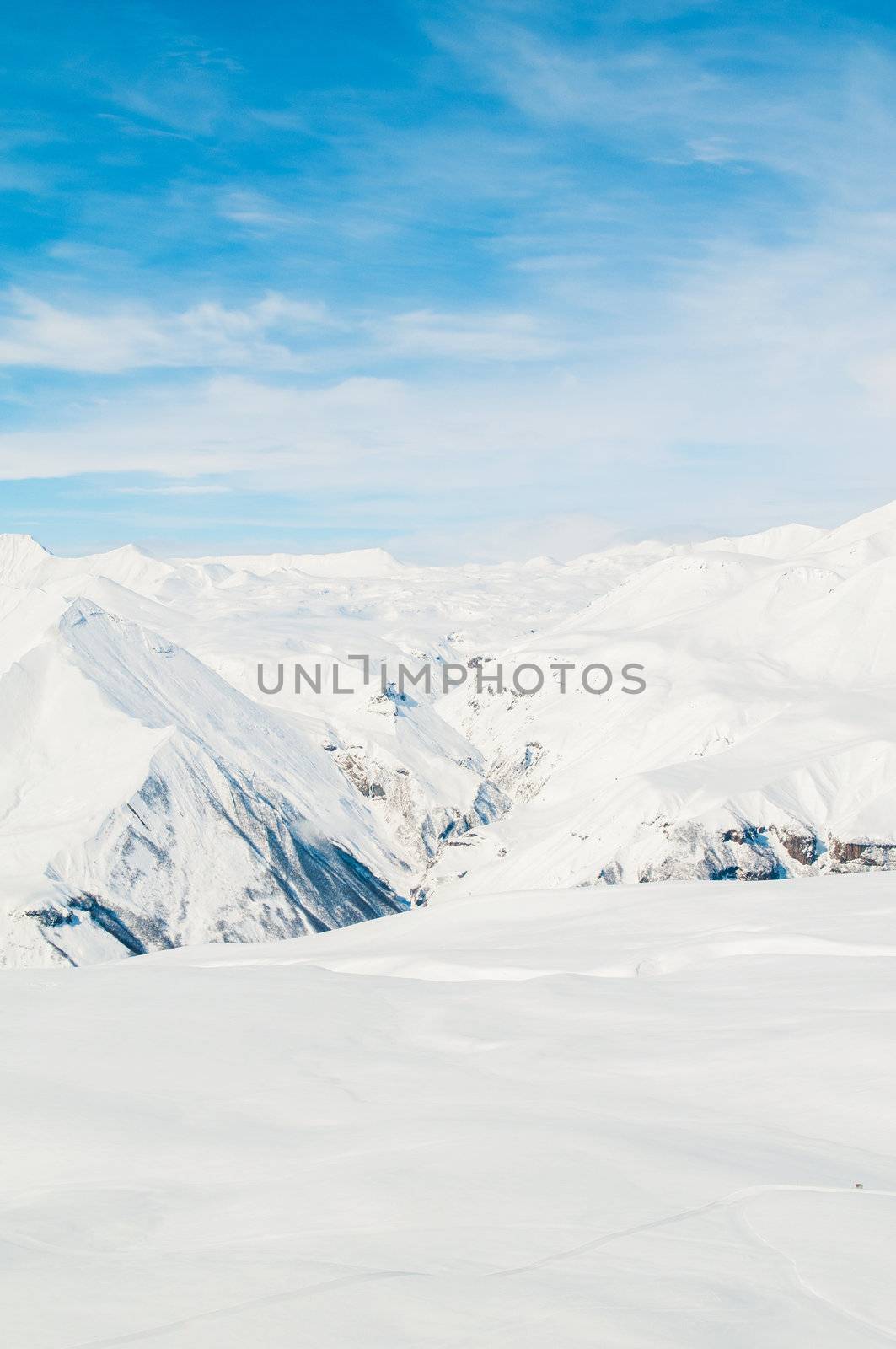 Snow mountains on bright winter day