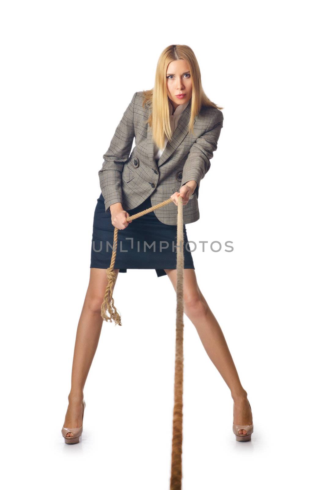 Businesswoman in tug of war concept