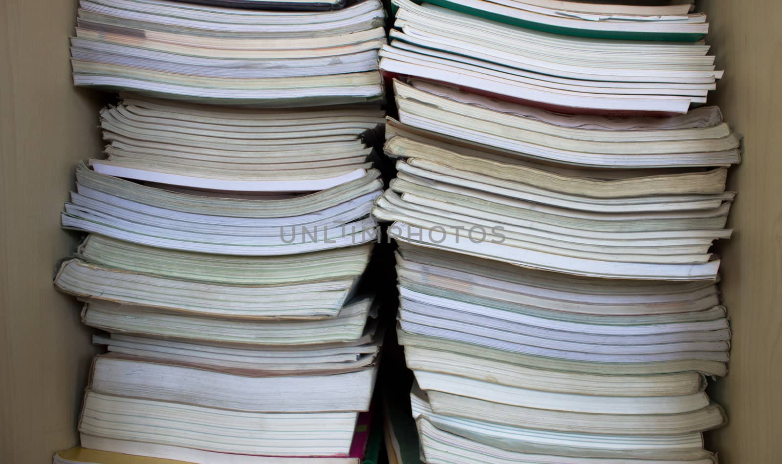 Stack of used books detail by catalinr