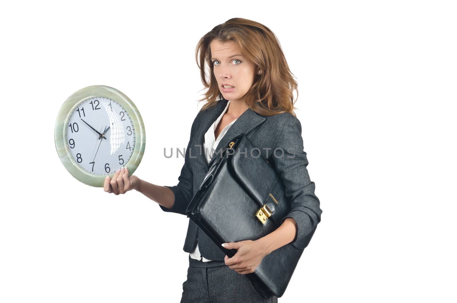 Businesswoman with clock isolated on white