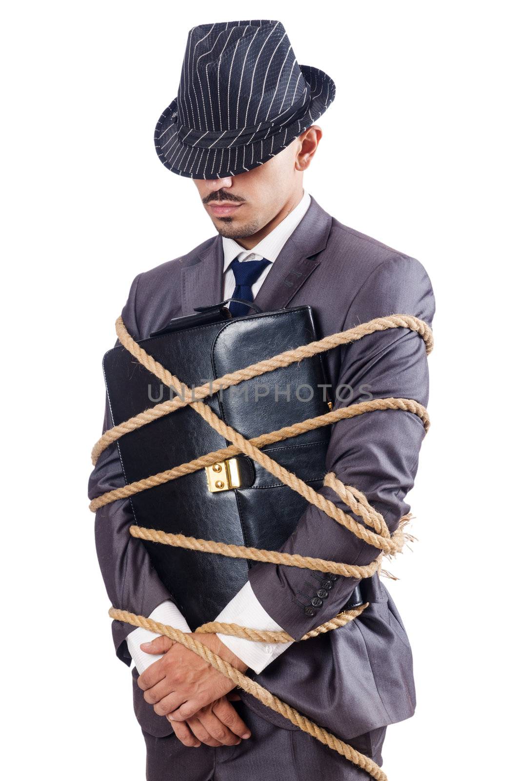 Businessman tied up with rope