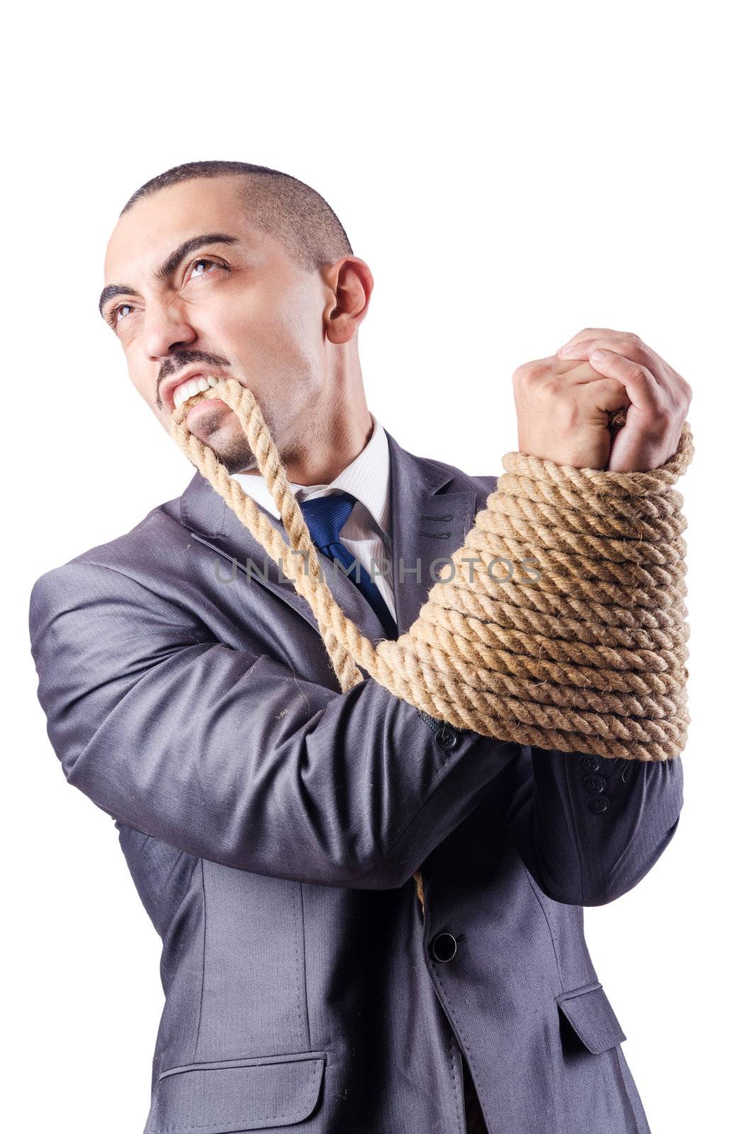 Businessman tied up with rope