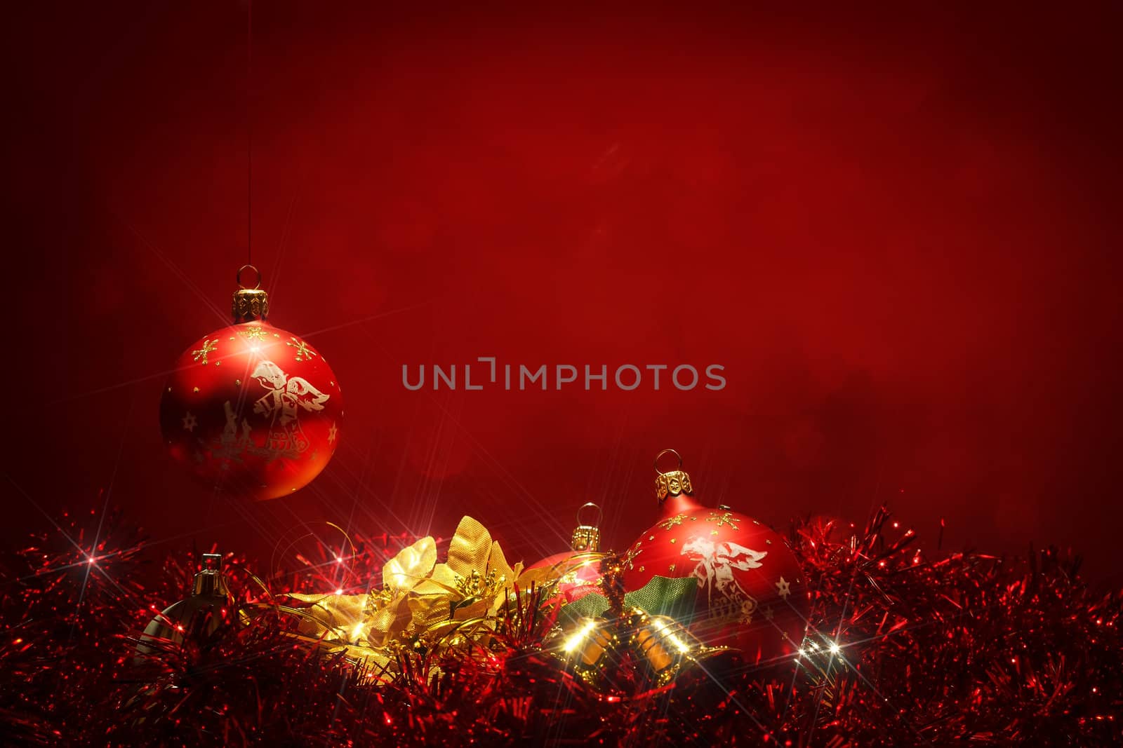 dark red christmas background with red ball and glow stars