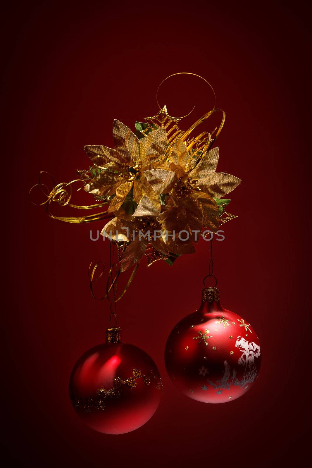red christmas balls on dark red background