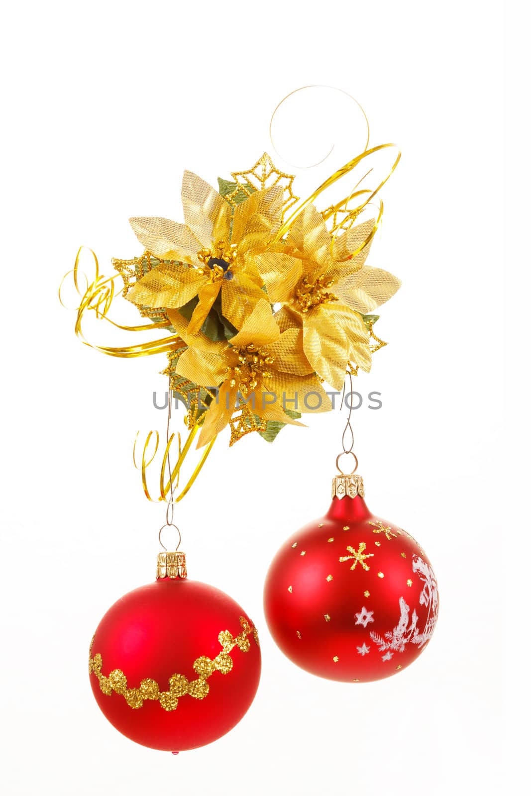 Red christmas balls with decorations on white