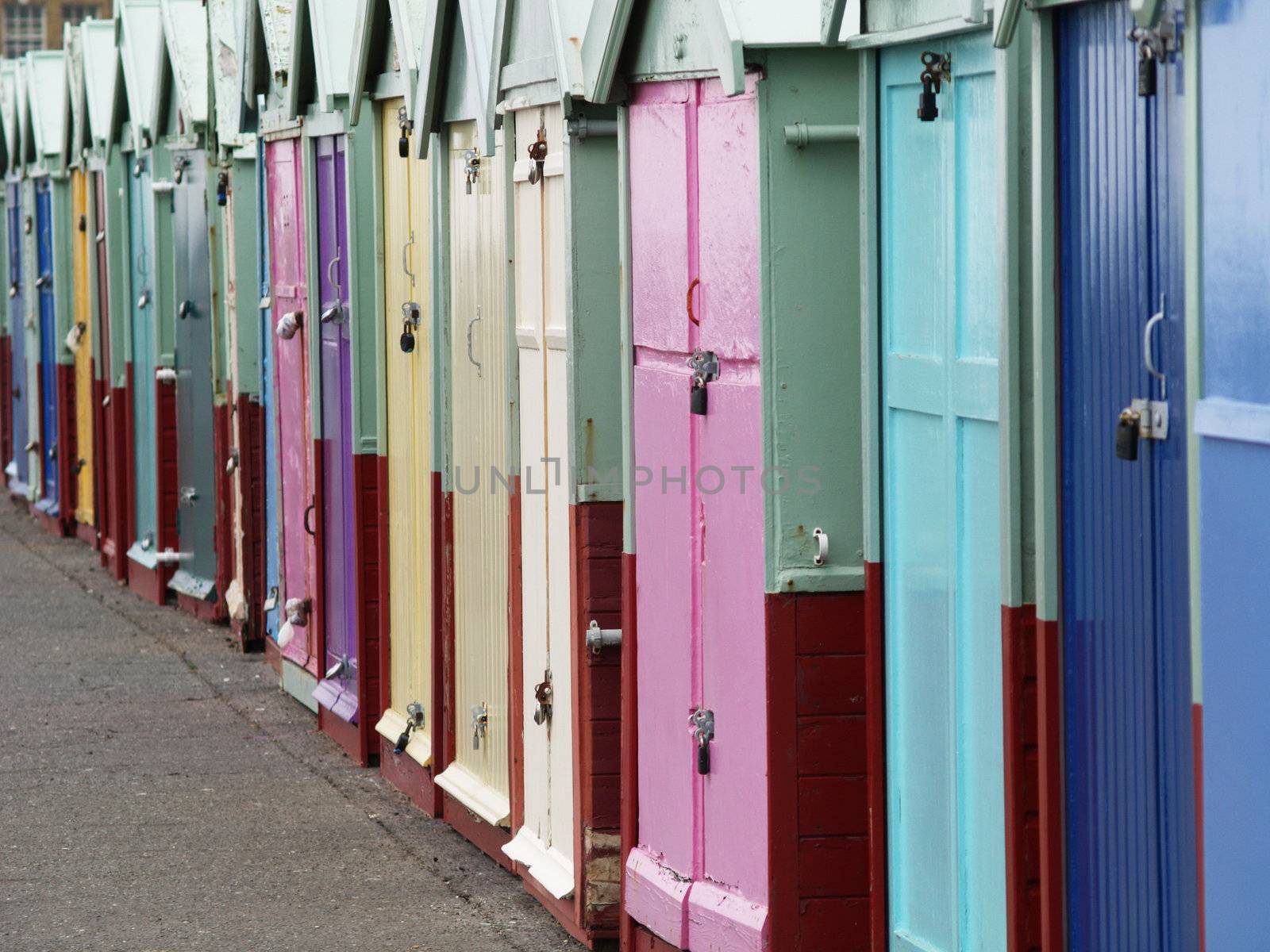 Colorful houses at Brighton Beach by anderm