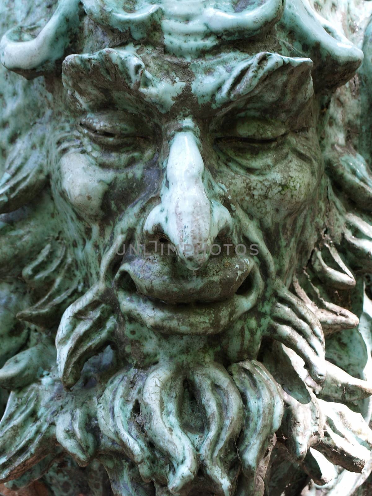 Face sculpture of a scary man by anderm