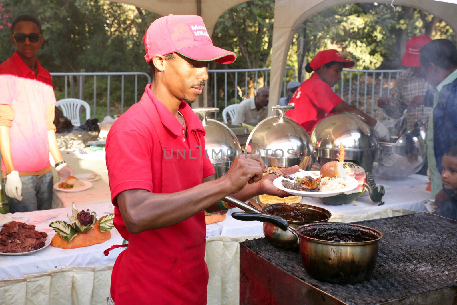 Addis Ababa â  November 18: Restaurants and caterers prepare local and international cuisines for the palates of Addis Ababa residents attending the 2012 Taste of Addis food festival on November 18, 2012 in Addis Ababa, Ethiopia