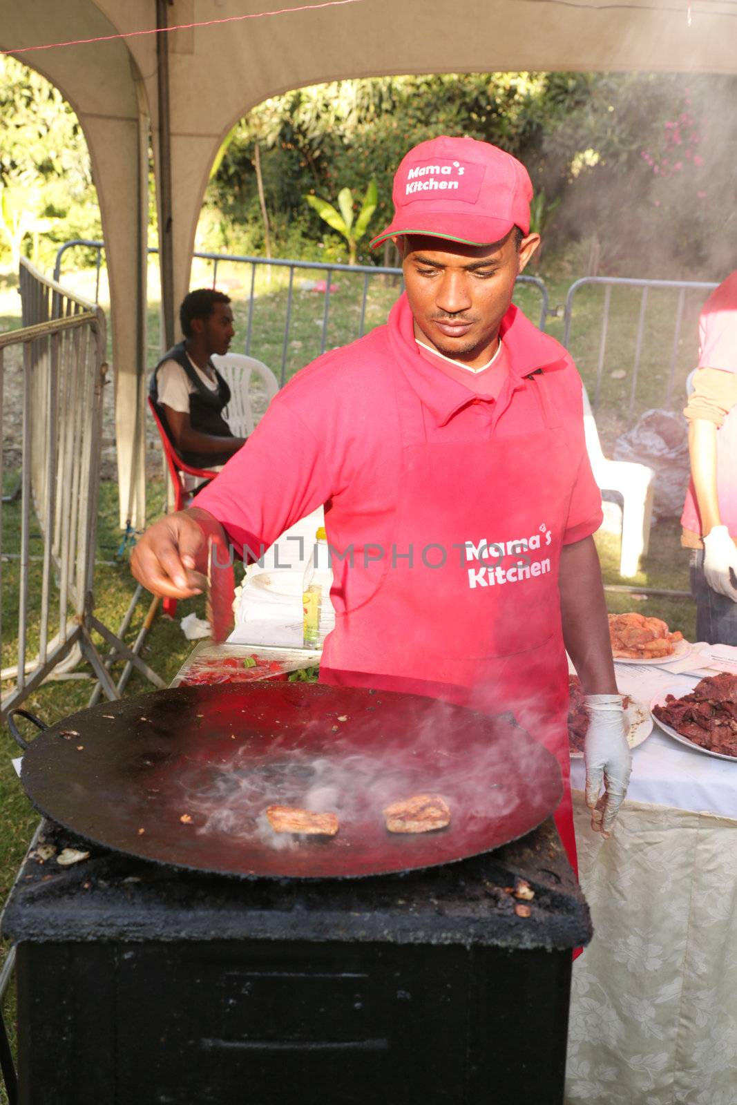 Addis Ababa â  November 18: Restaurants and caterers prepare local and international cuisines for the palates of Addis Ababa residents attending the 2012 Taste of Addis food festival on November 18, 2012 in Addis Ababa, Ethiopia