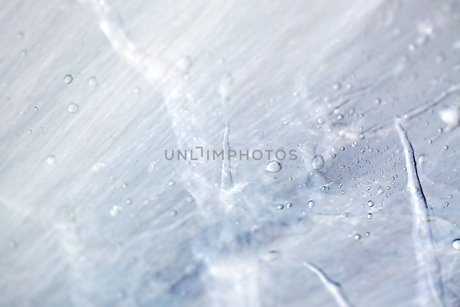 Macro picture of water droplets on window, shallow DOF