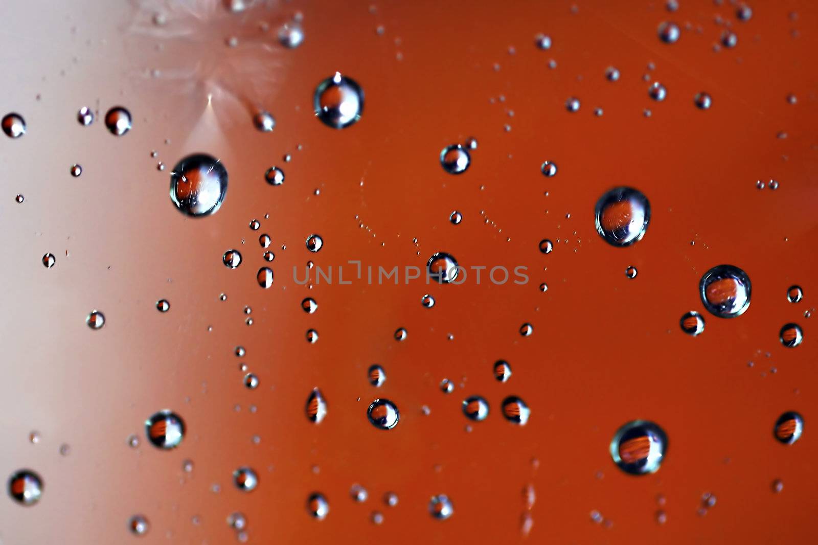 Macro picture of water droplets on window, shallow DOF