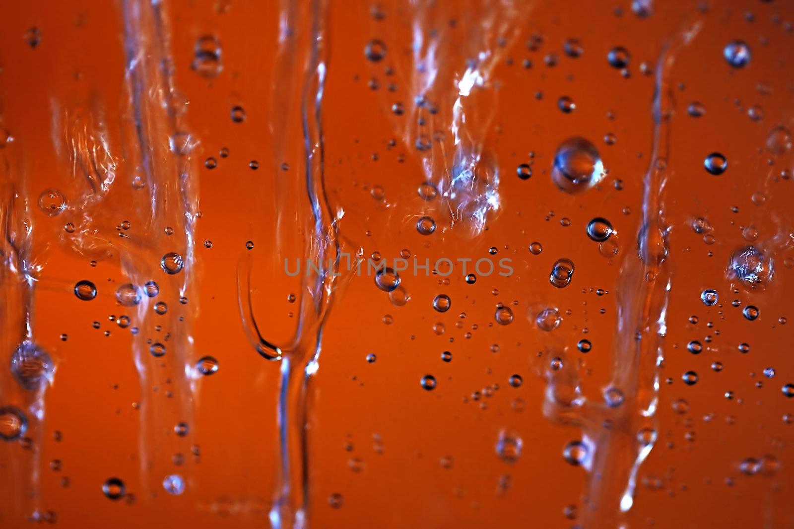 Macro picture of water droplets on window, shallow DOF