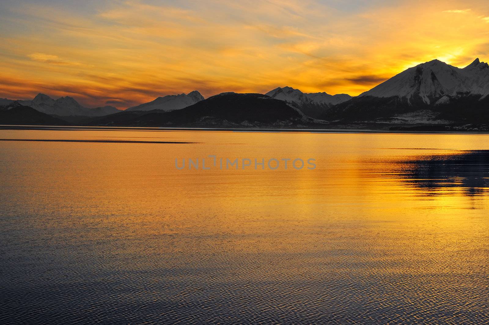 Watching the sunset over the mountains from the Beagle Channel in Tierra del Fuego, Argentina.