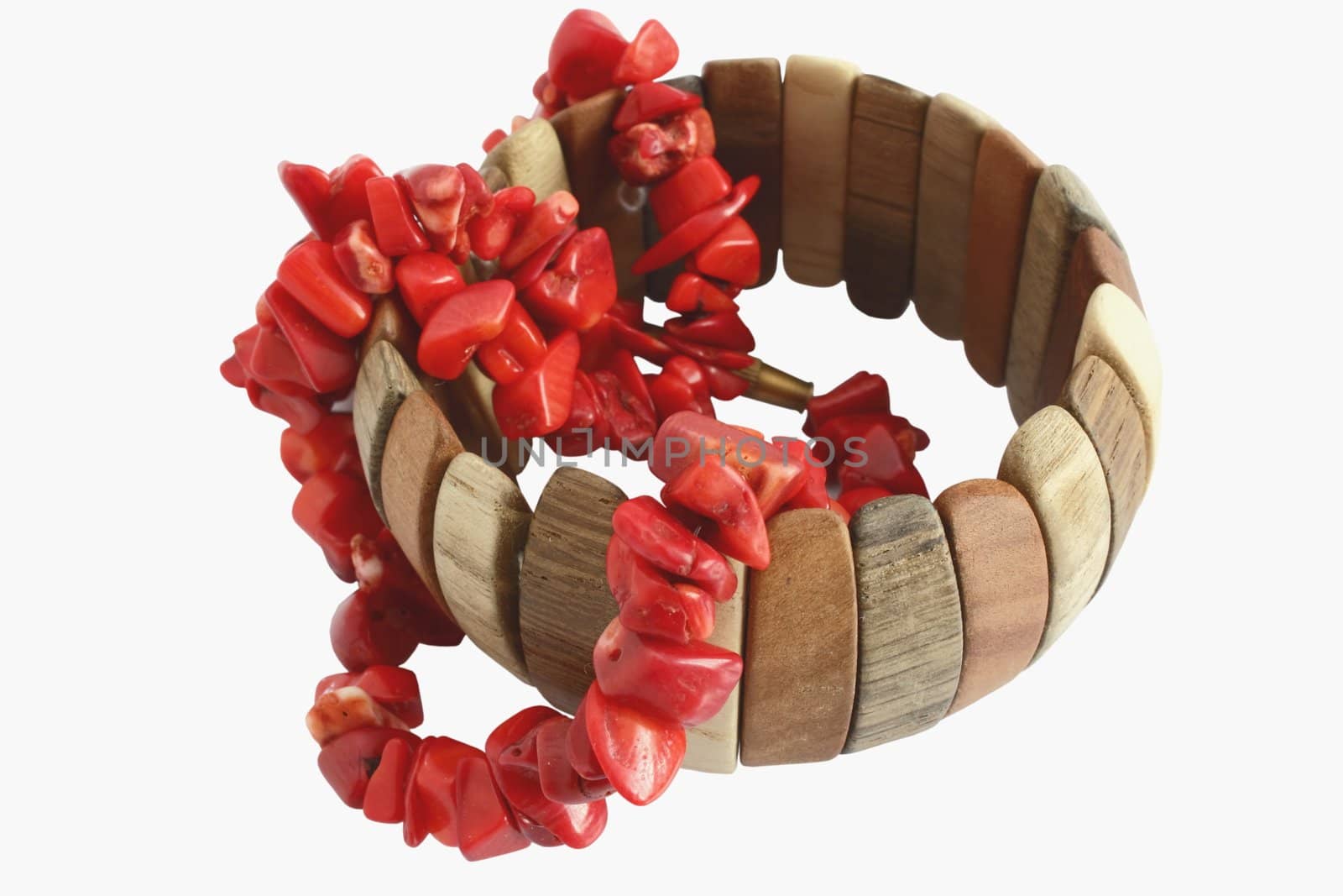 vintage wooden bracelet and red coral beads isolated on white background