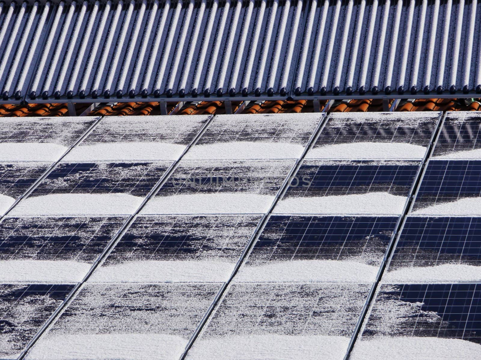 Solar panel on a roof and one for heating