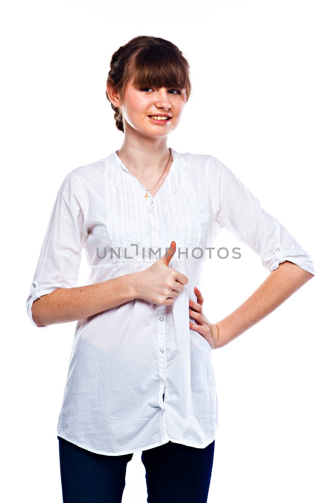 Young and funny girl in a white shirt and dark blue jeans
