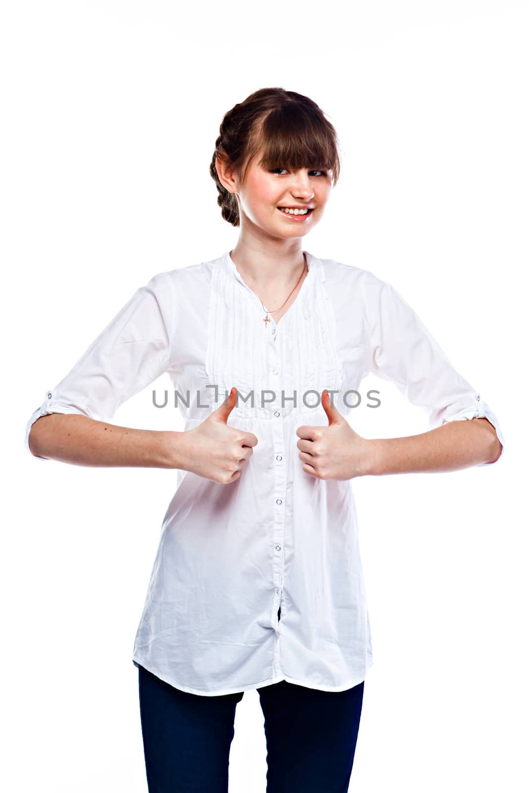 Young and funny girl in a white shirt and dark blue jeans