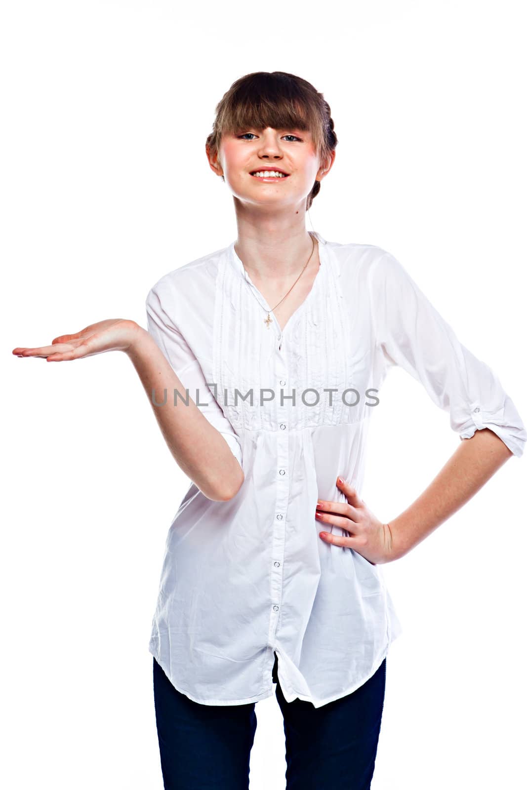 Young and funny girl in a white shirt and dark blue jeans