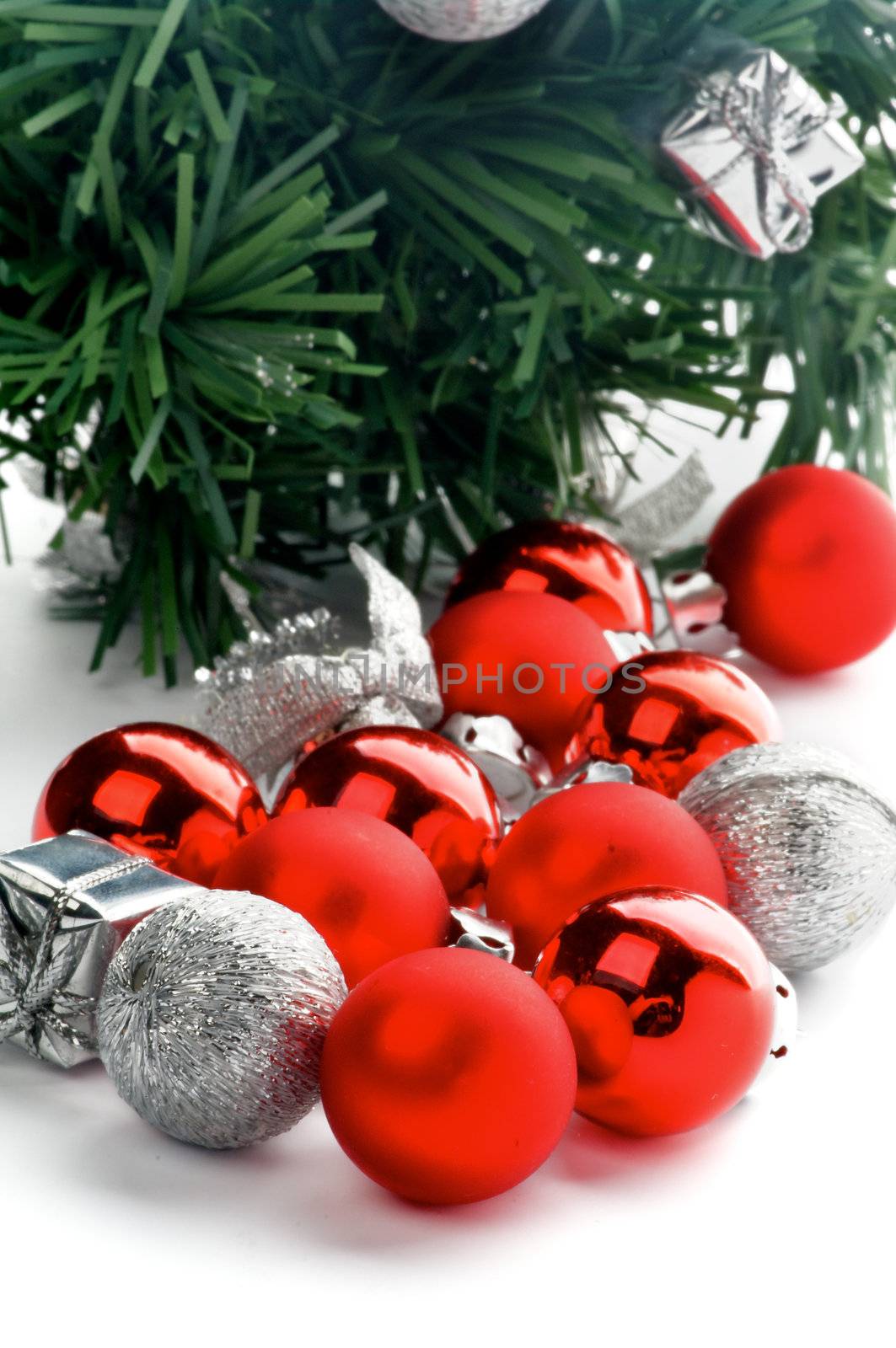 Red and Silver Baubles closeup on New Year Tree background