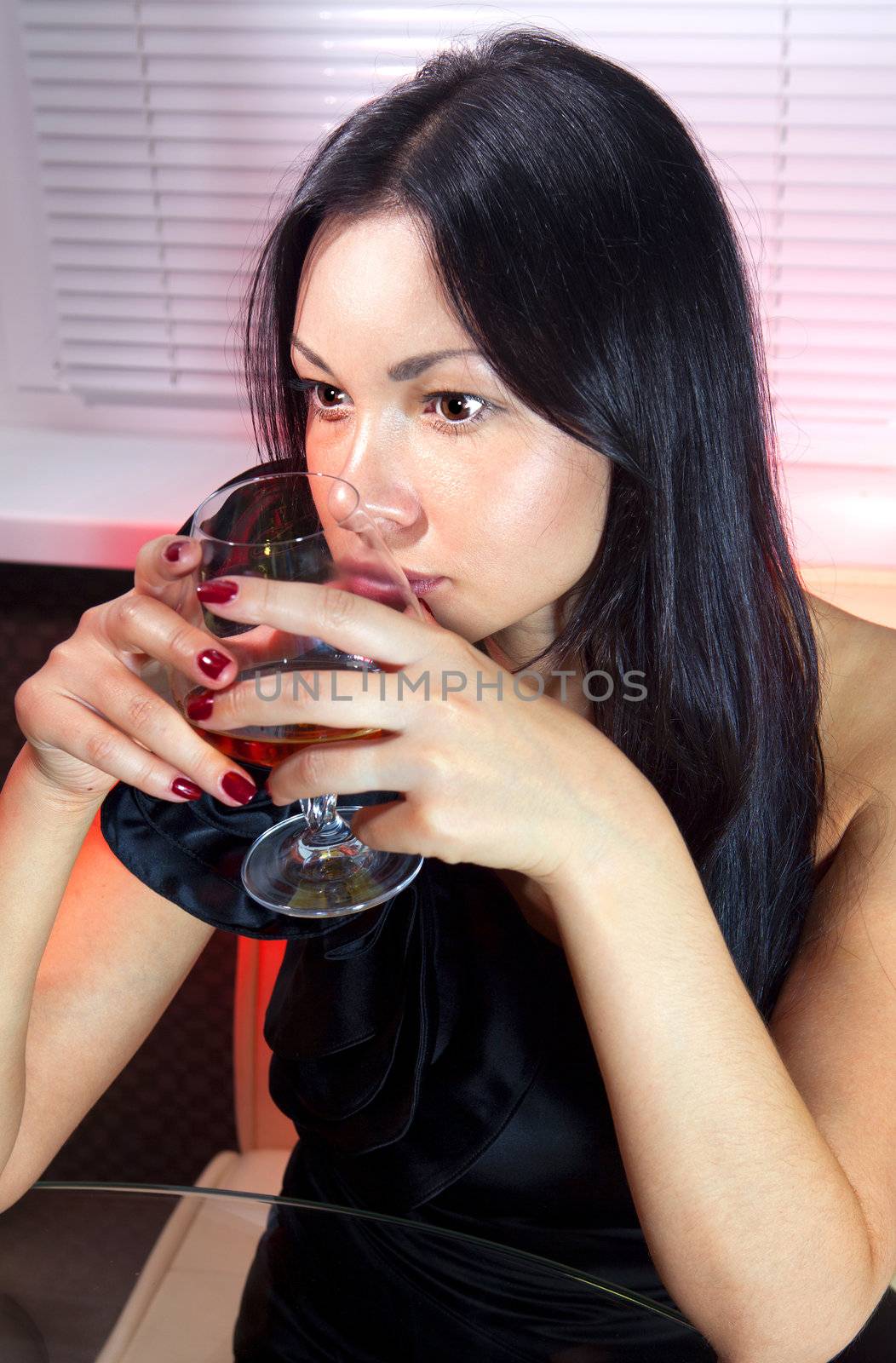 woman with glass of brandy ll by ssuaphoto