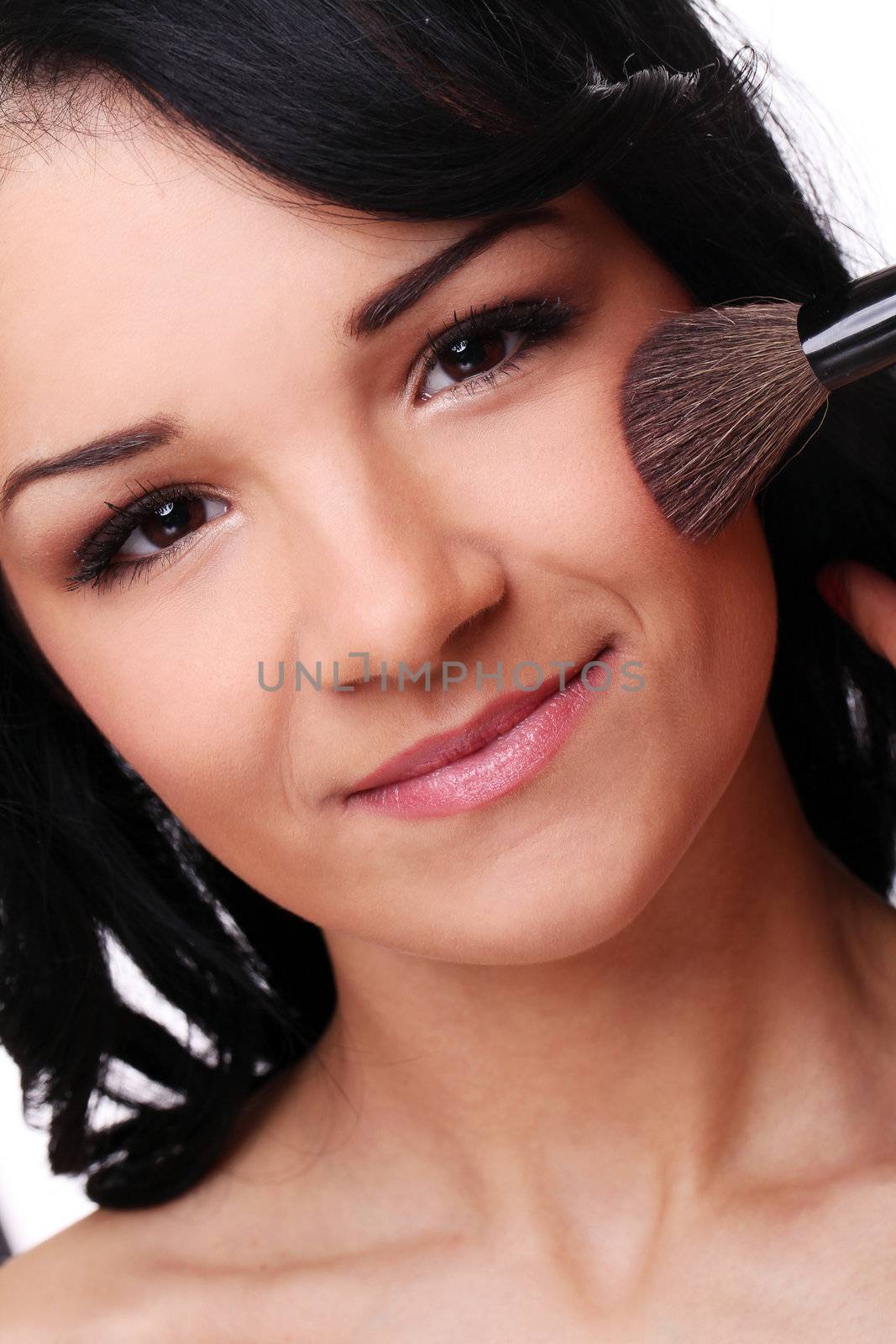 Portrait of beautifull woman with brush isolated on a white