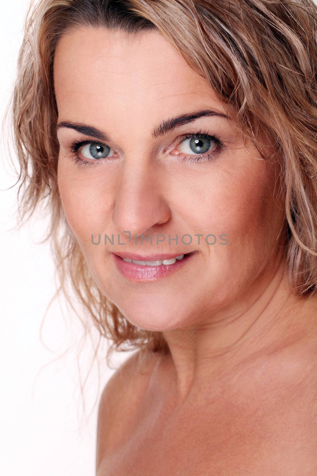 Portrait of beautiful mid aged woman isolated on a white