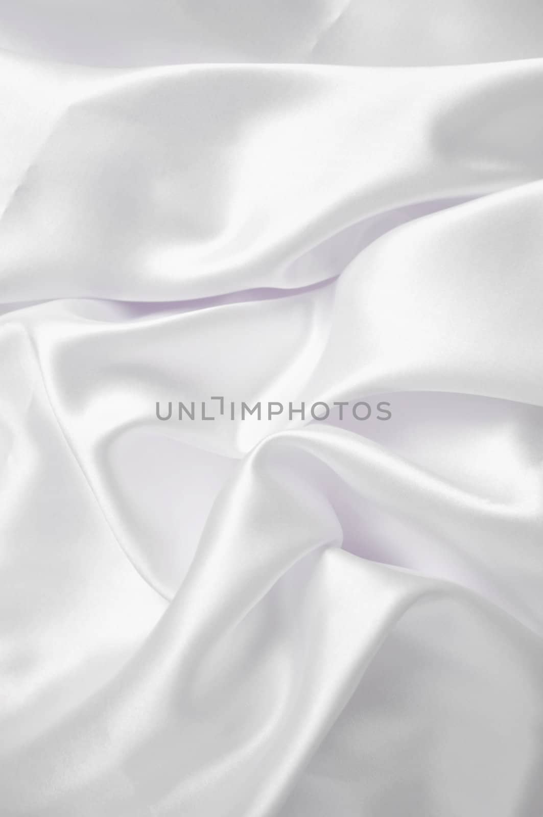 White smooth fabric background with shine.