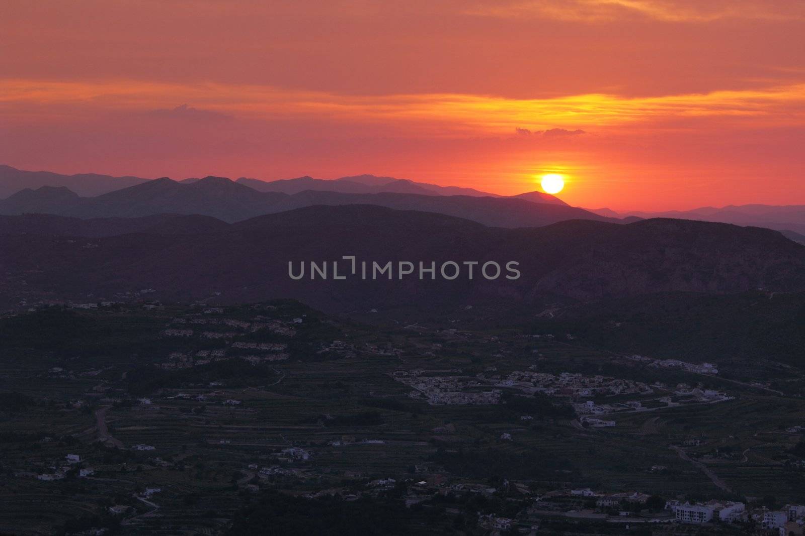 Summer landscape in mountains with the sun