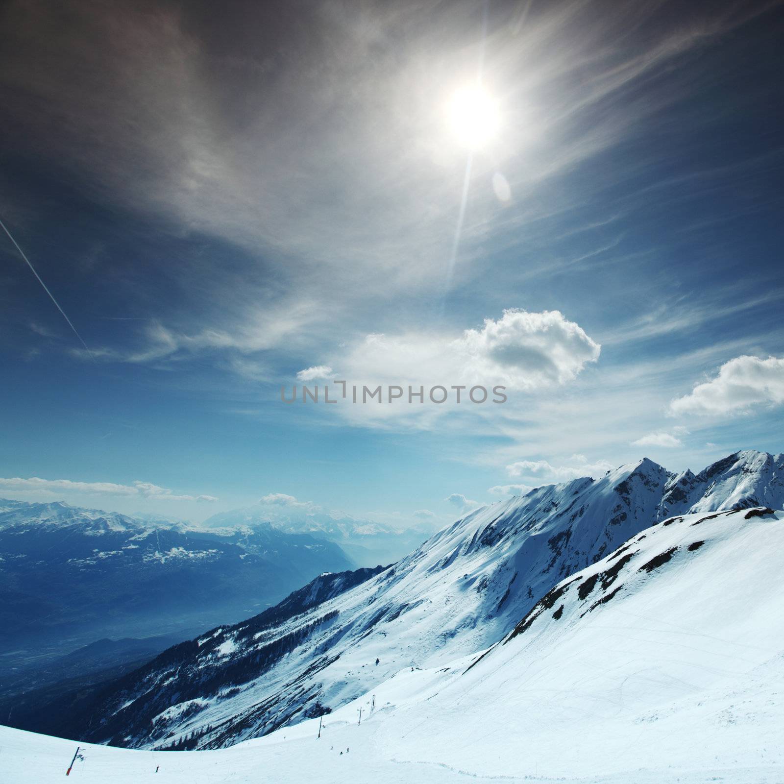 top of mountains in blue sky