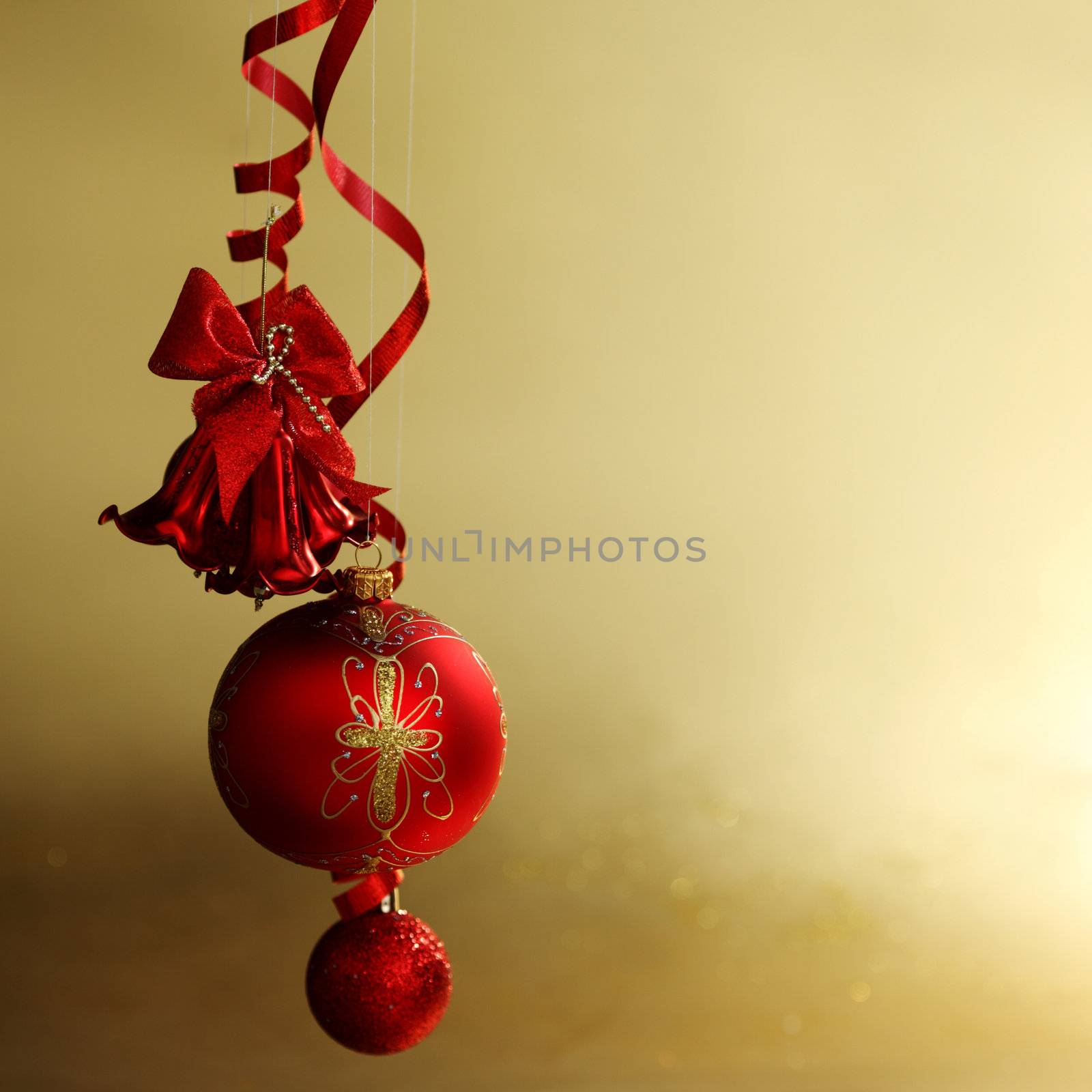  red christmas balls on gold  background