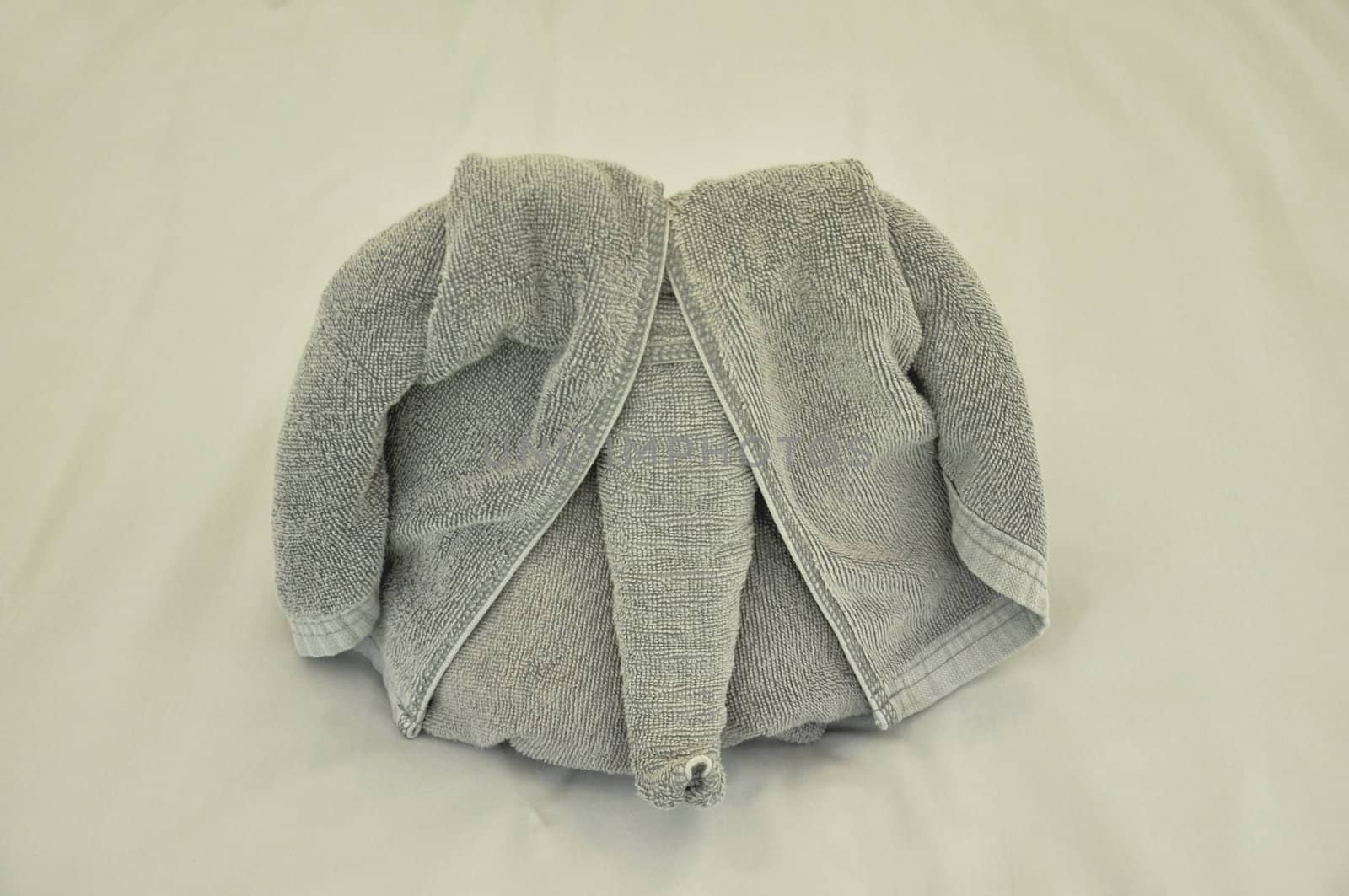 Grey towel is elephant figure.