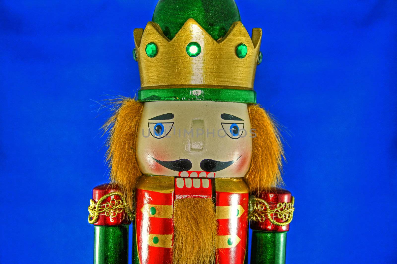 Close up view of Nutcracker on blue background