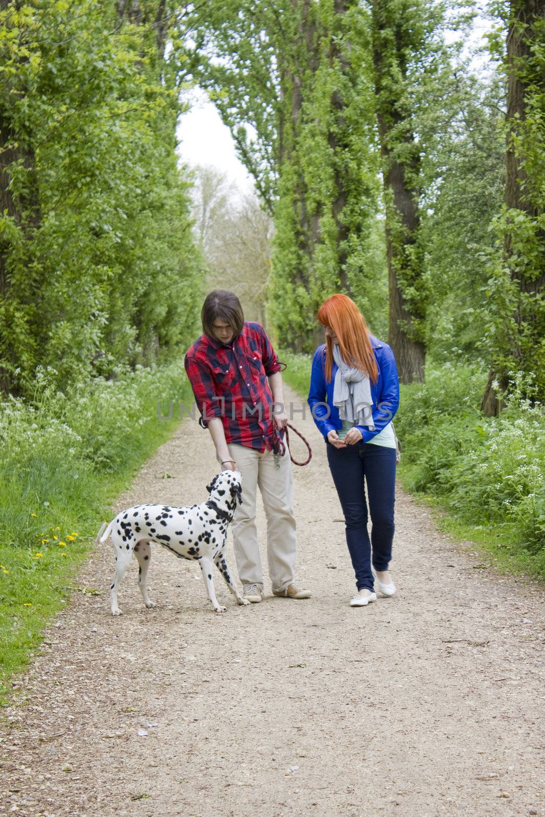 young couple people and dog 