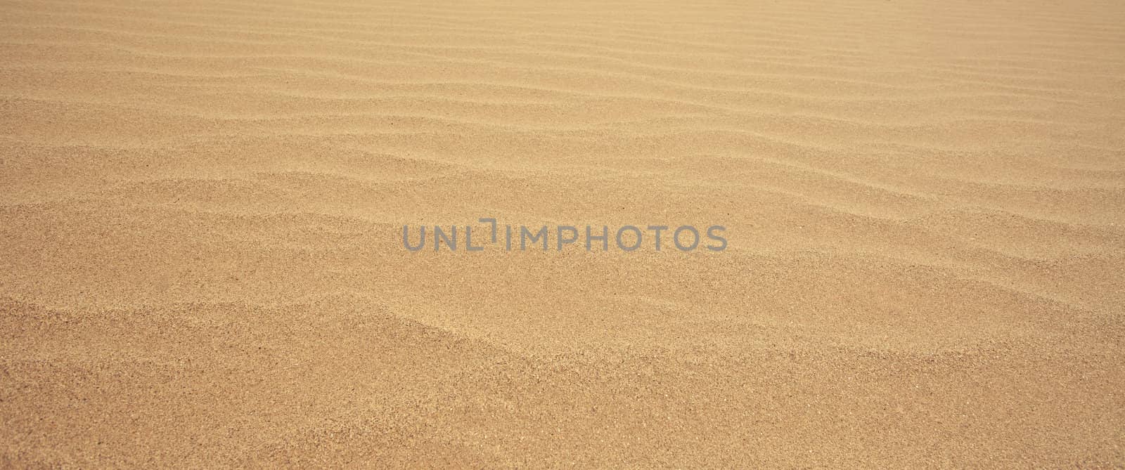 rippled sand by witthaya