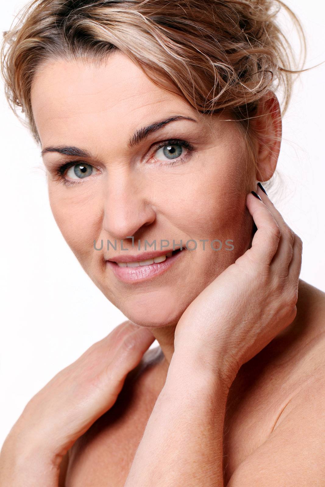 Portrait of beautiful mid aged woman isolated on a white
