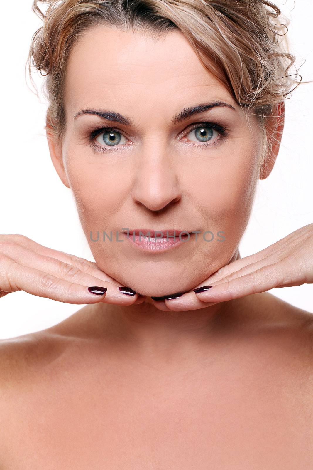 Portrait of beautiful mid aged woman isolated on a white