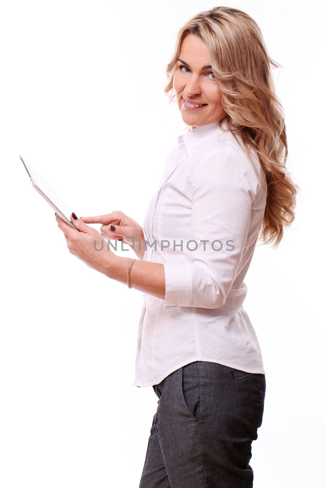 Portrait of 40 years old woman in office suit with papers in hand