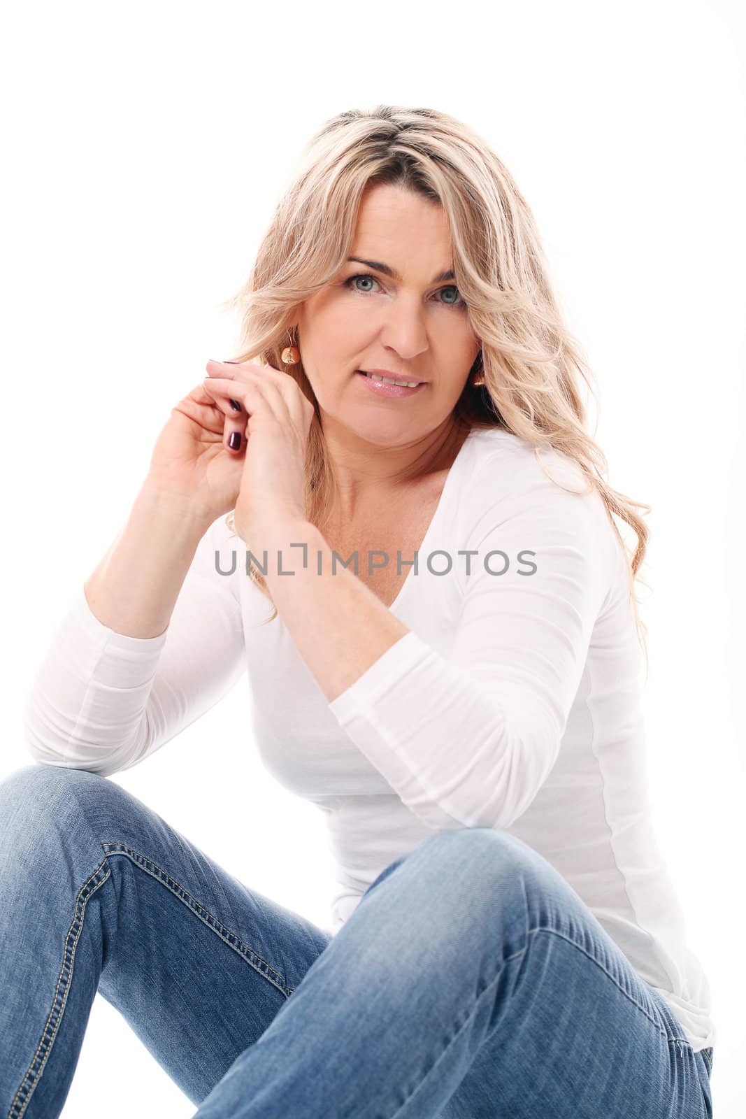 Portrait of Beautiful mid aged woman on a white background