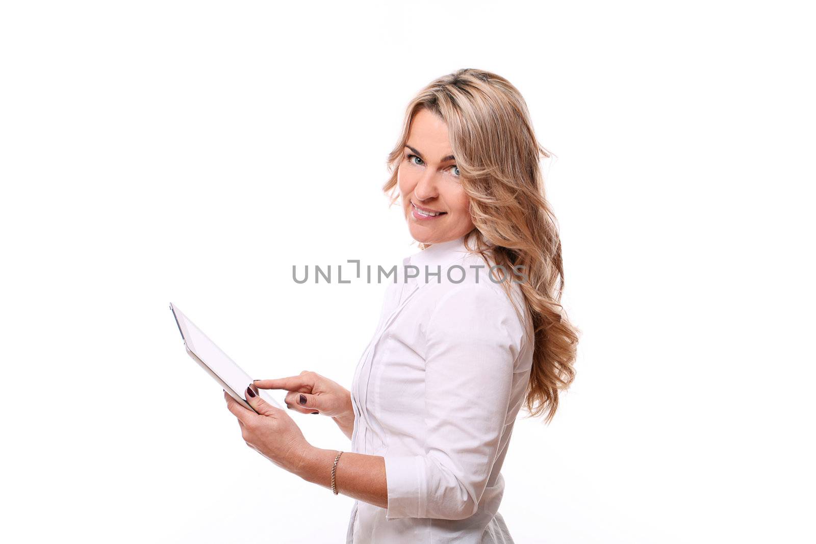 Portrait of 40 years old woman in office suit with papers in hand