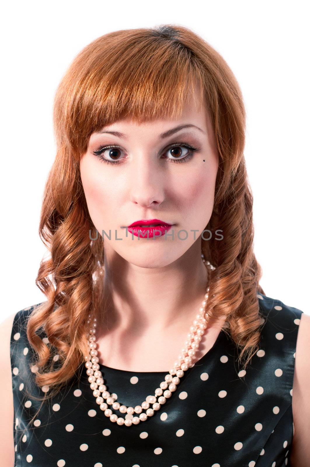 Retro girl with pearl necklace smiling