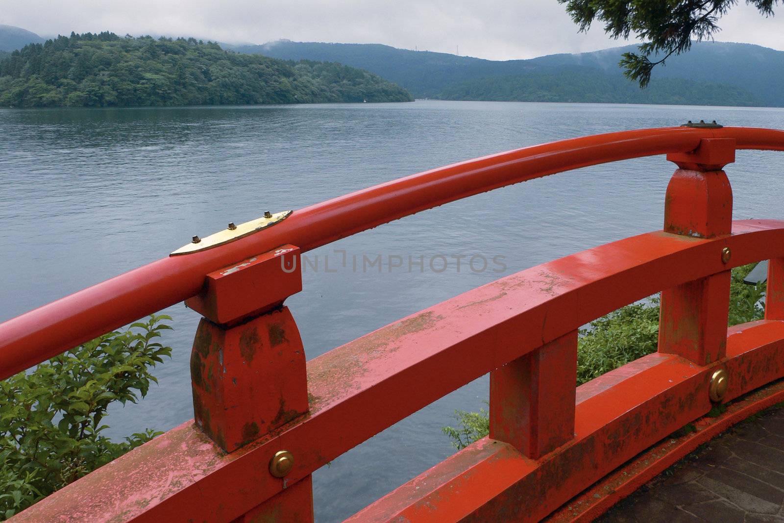 view to the lake Ashi from red japanese bridge in Hakone