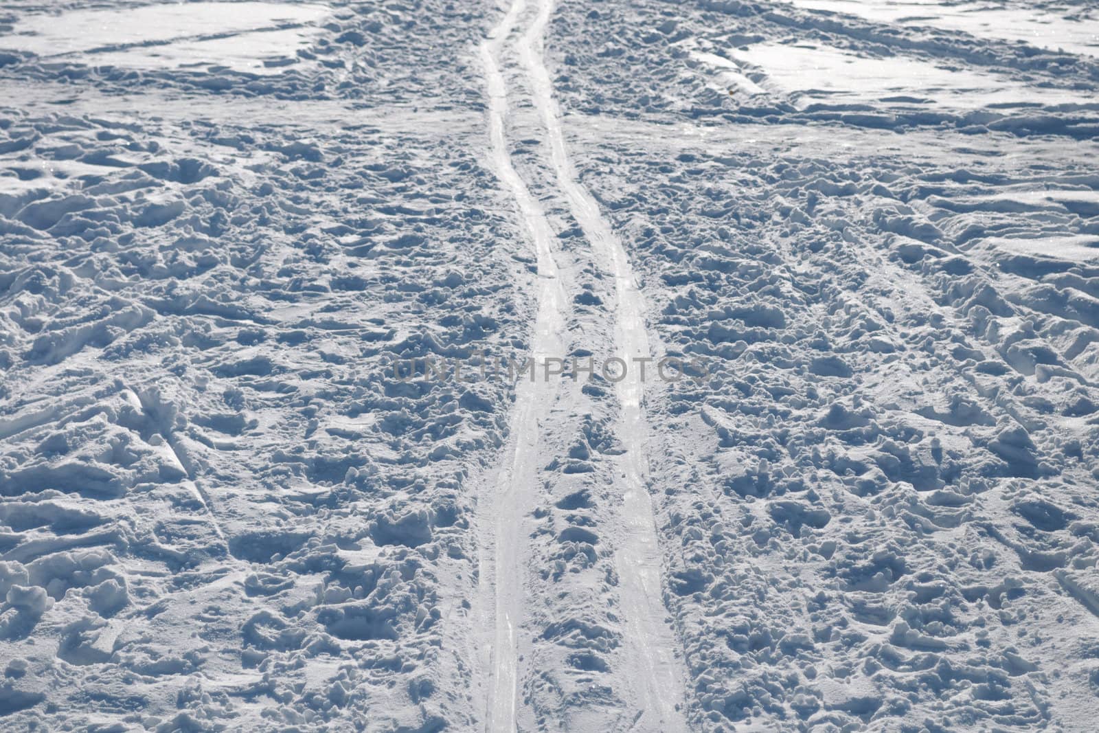 thick ski track on trampled snow