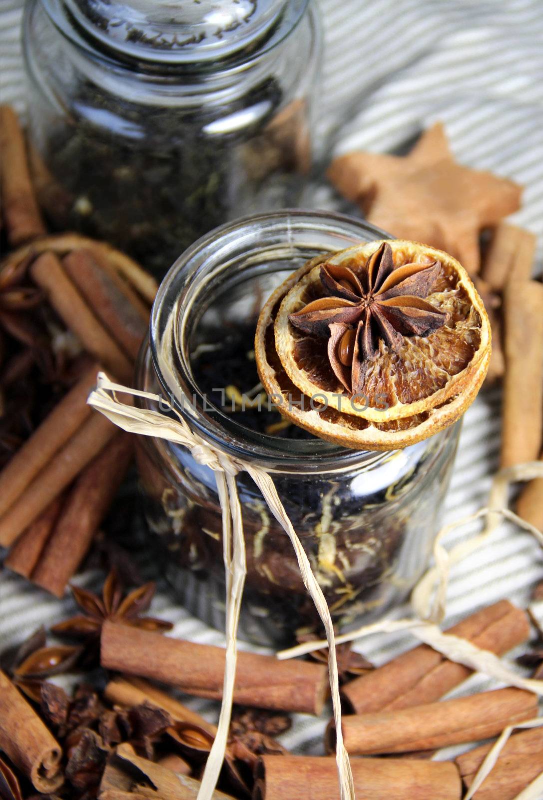 Tea, cinnamon sticks and dry orange