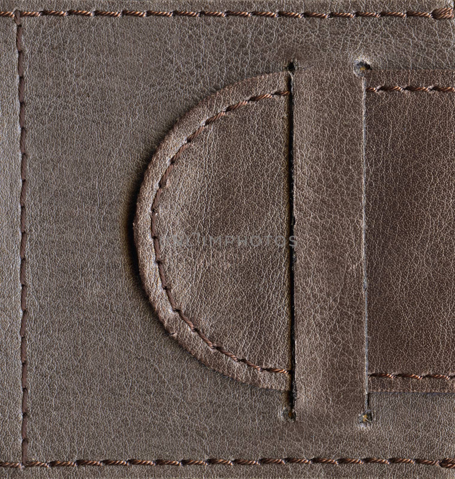 brown textured leather lock, belt stitched by thread over edges, high-resolution scan