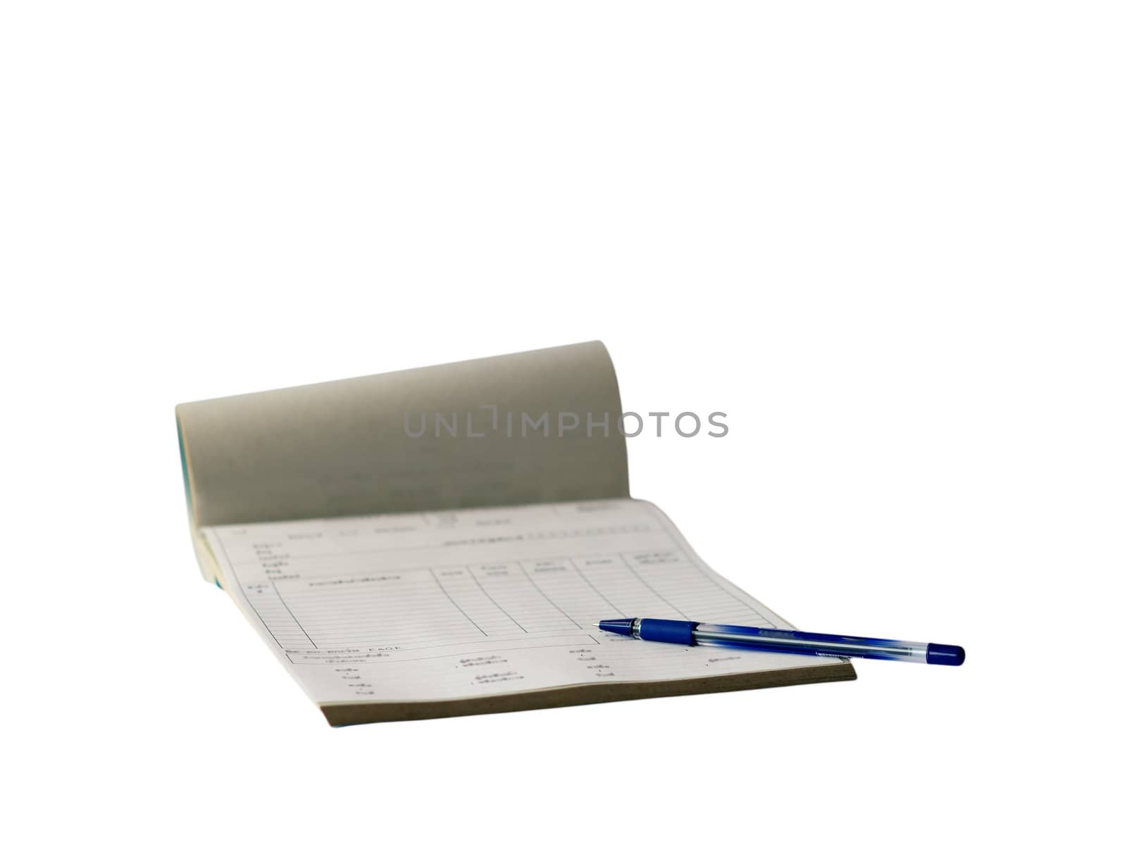 Opened receipt pad and pen isolated on white background.