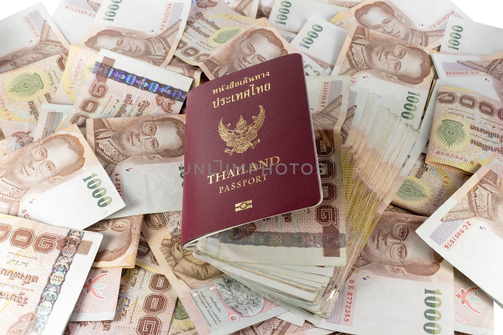 thailand passport and money banknotes as background.