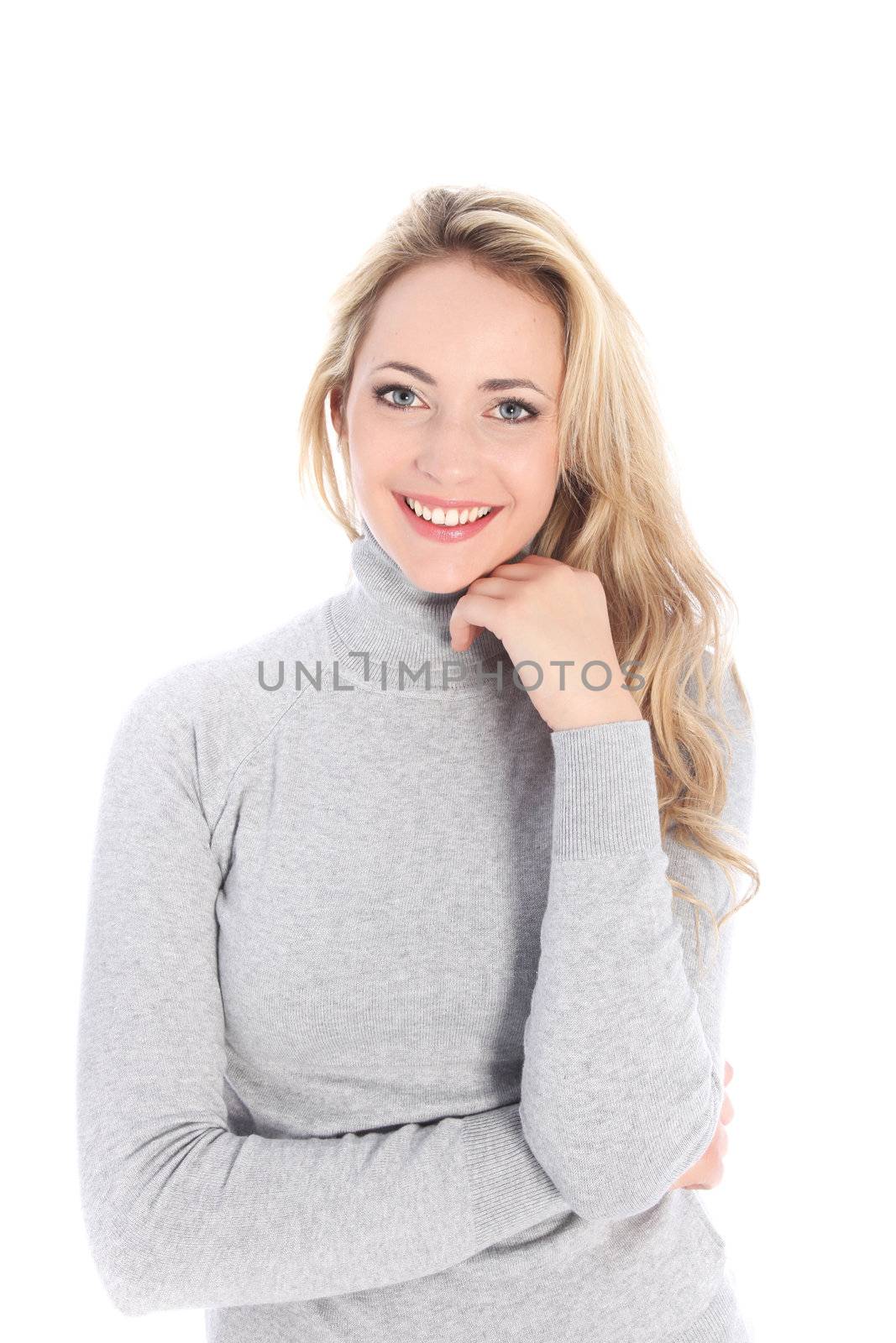 Gorgeous blond wearing grey sweatshirt posed like pro. Gorgeous blond wearing grey sweatshirt posed like pro.